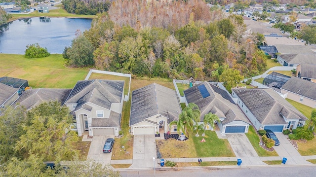 birds eye view of property featuring a water view