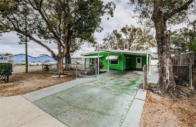 exterior space with a carport