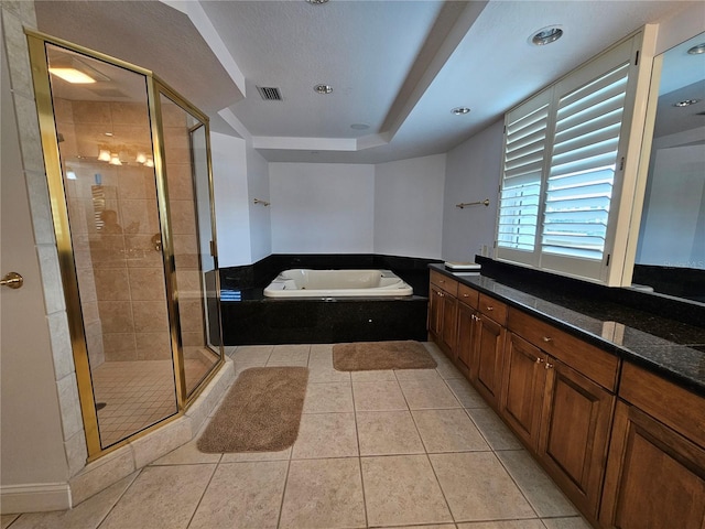 bathroom with separate shower and tub, tile patterned flooring, and vanity