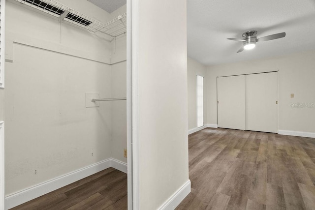 interior space featuring hardwood / wood-style flooring and ceiling fan