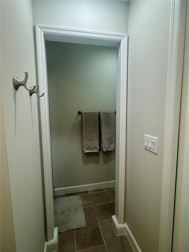 bathroom with tile patterned flooring