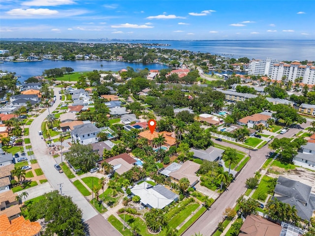 bird's eye view with a residential view and a water view