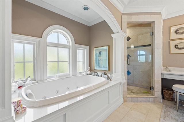 bathroom featuring a stall shower, crown molding, a tub with jets, and tile patterned floors