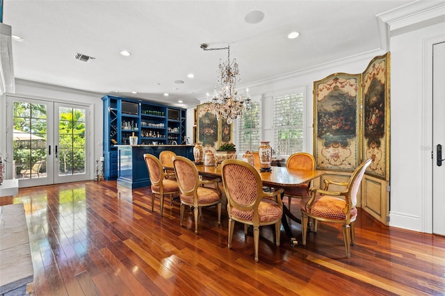 dining area featuring visible vents, ornamental molding, a wealth of natural light, and french doors