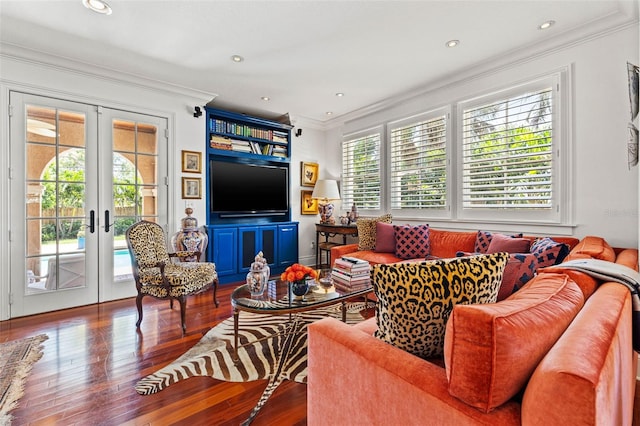 living room featuring ornamental molding, french doors, plenty of natural light, and wood finished floors