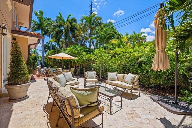 view of patio featuring outdoor dining space and outdoor lounge area