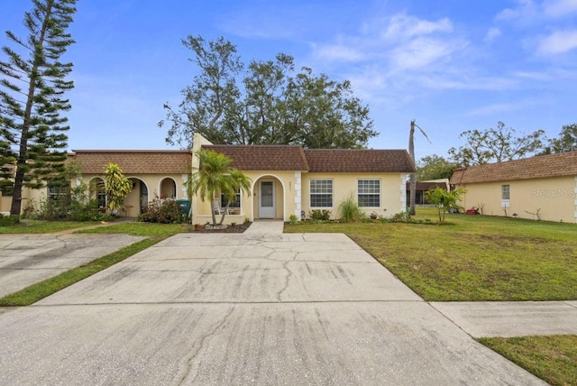 view of front of home with a front yard