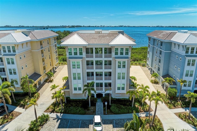 birds eye view of property featuring a water view