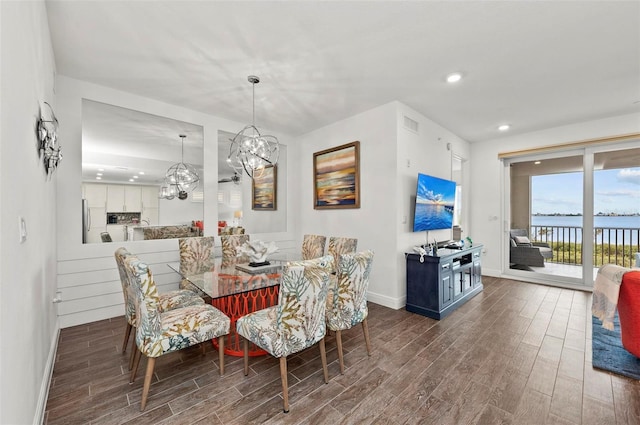 dining room featuring a notable chandelier