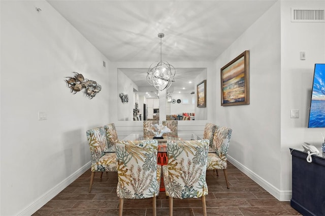 dining room with a chandelier