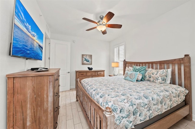 bedroom featuring ceiling fan and light hardwood / wood-style floors