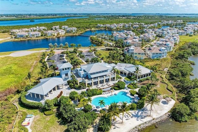 birds eye view of property featuring a water view