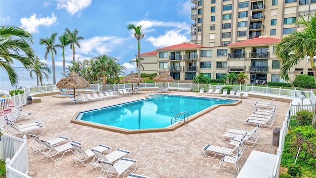 view of swimming pool with a patio