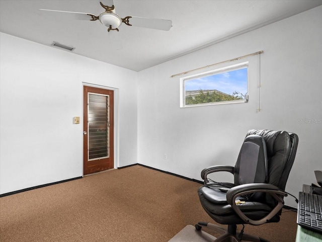 home office with carpet flooring and ceiling fan