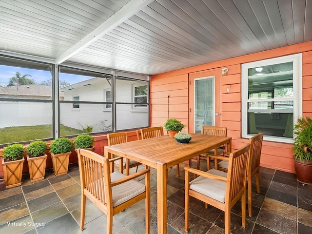 sunroom with wooden ceiling