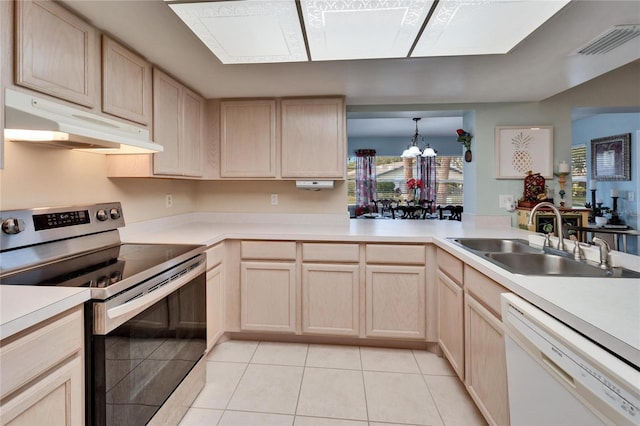 kitchen featuring stainless steel electric stove, an inviting chandelier, light brown cabinetry, sink, and white dishwasher