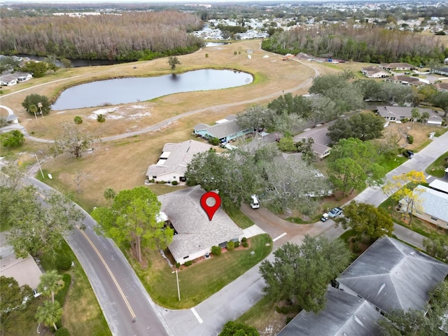 birds eye view of property featuring a water view