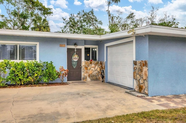 property entrance featuring a garage