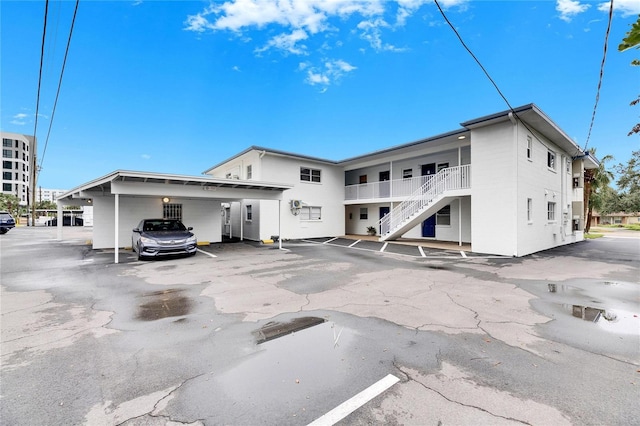 view of property featuring a carport