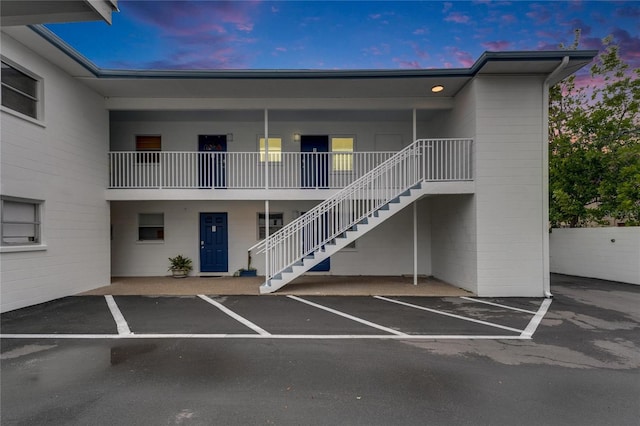 view of outdoor building at dusk