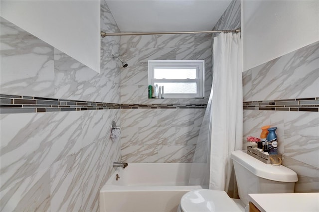 full bathroom featuring vanity, tile walls, shower / bath combo, and toilet