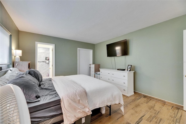 bedroom featuring light hardwood / wood-style floors