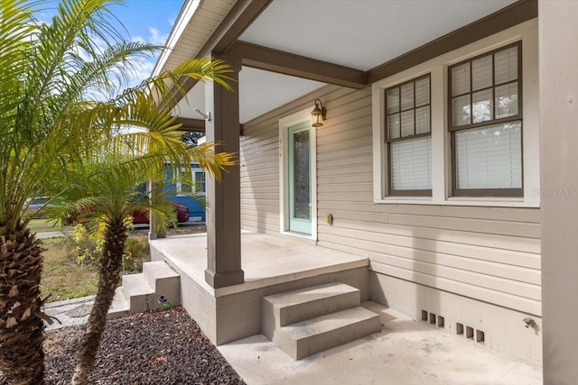 entrance to property with covered porch