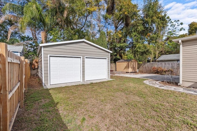 garage with a yard