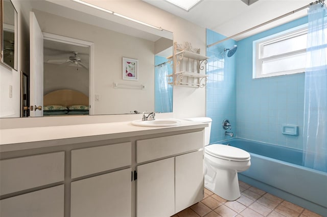 full bathroom with toilet, ceiling fan, tile patterned flooring, shower / bathtub combination with curtain, and vanity