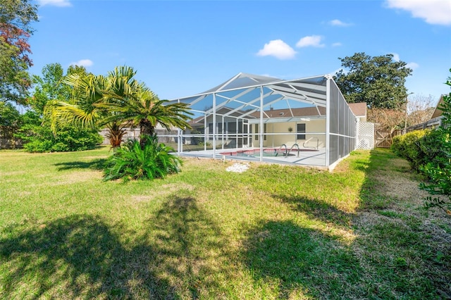 view of yard featuring a lanai and a patio