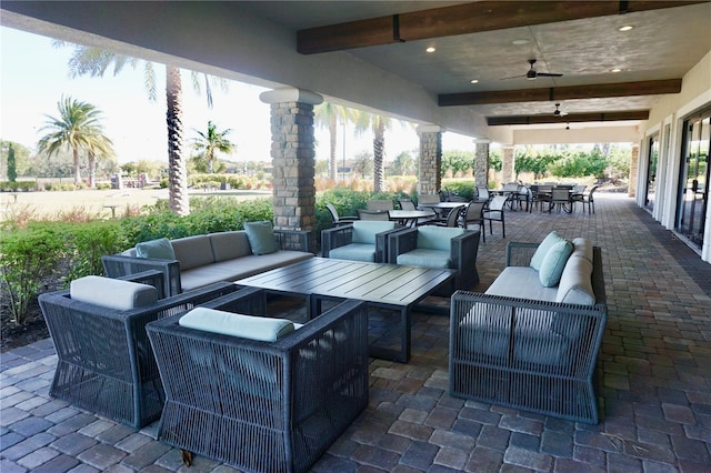 view of patio / terrace with outdoor lounge area and ceiling fan