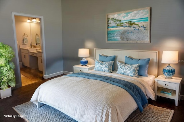 5426 Rushmere Ct, Palmetto, FL 34221 - bedroom featuring wood finished floors and ensuite bath
