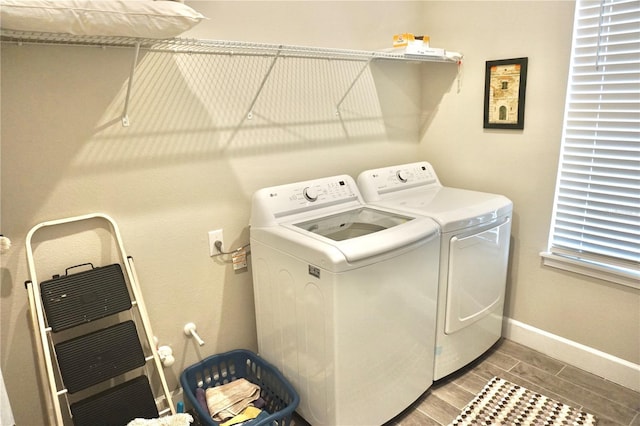 5426 Rushmere Ct, Palmetto, FL 34221 - laundry room with washing machine and clothes dryer and wood tiled floors
