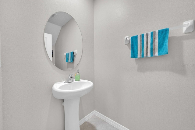 bathroom with tile patterned flooring