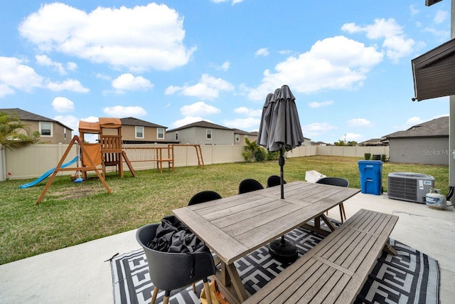 view of patio / terrace with a playground and central air condition unit