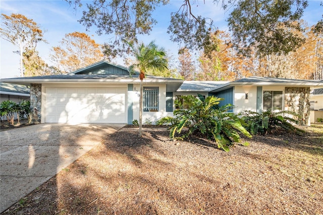 ranch-style home with a garage