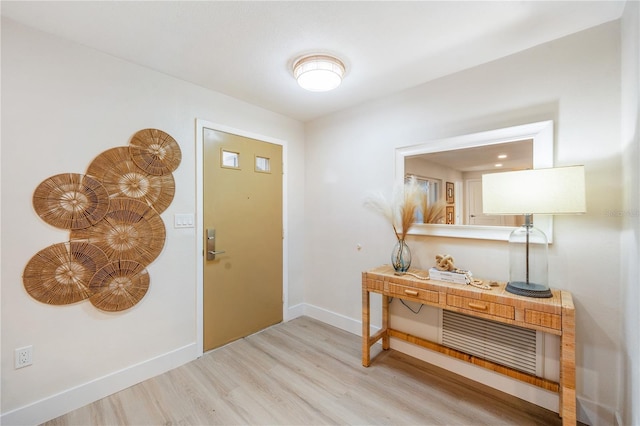 foyer with light hardwood / wood-style flooring