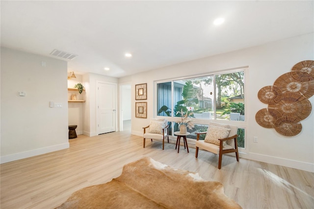 living area featuring light wood-type flooring