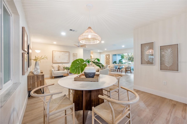 dining room featuring light wood-type flooring