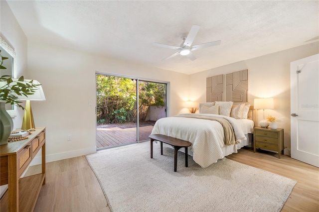 bedroom featuring ceiling fan, access to exterior, and light wood-type flooring