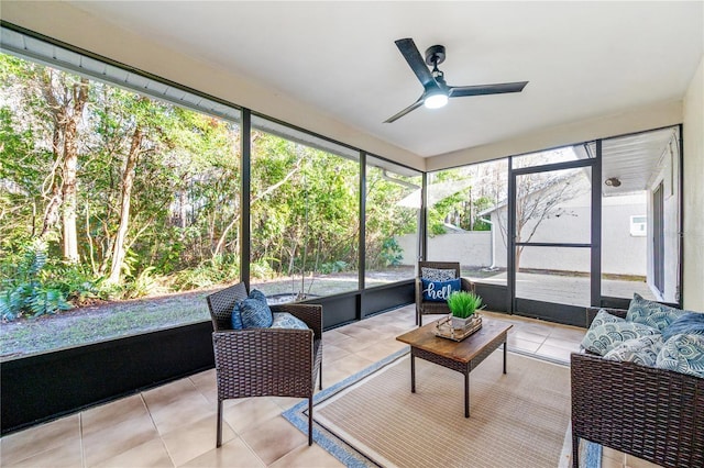 sunroom / solarium with ceiling fan and plenty of natural light