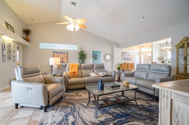 living room with ceiling fan with notable chandelier, light tile patterned floors, and high vaulted ceiling