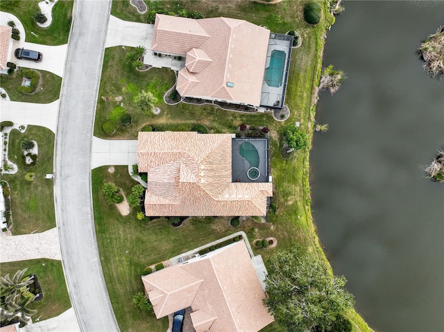 bird's eye view with a water view