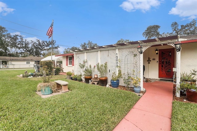 exterior space featuring a front yard