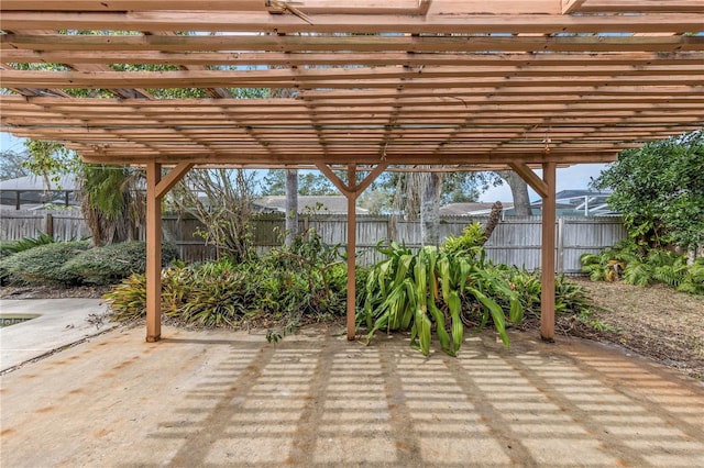 view of patio / terrace with a fenced backyard and a pergola