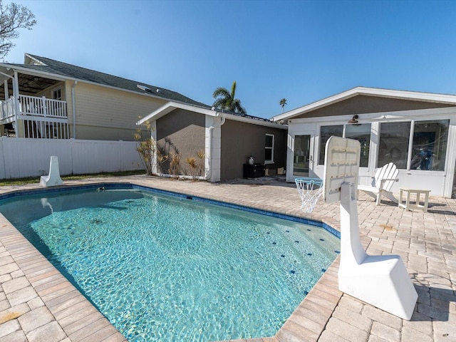 view of swimming pool featuring a patio