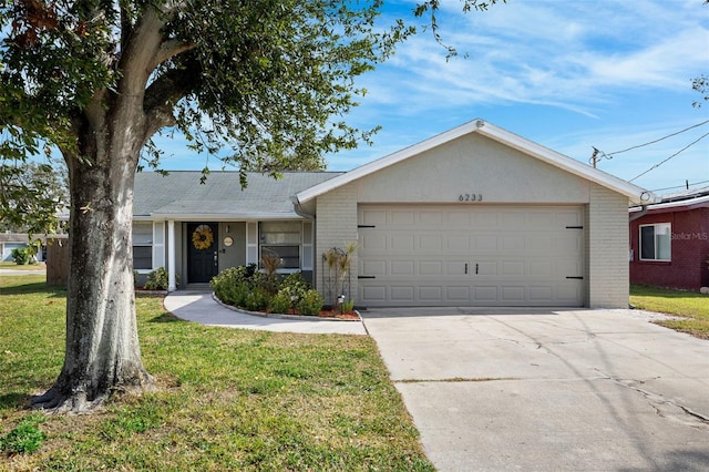 ranch-style house with a garage and a front lawn