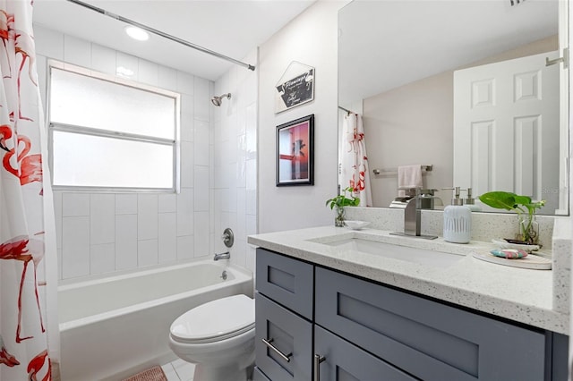 full bathroom with vanity, toilet, and shower / tub combo with curtain