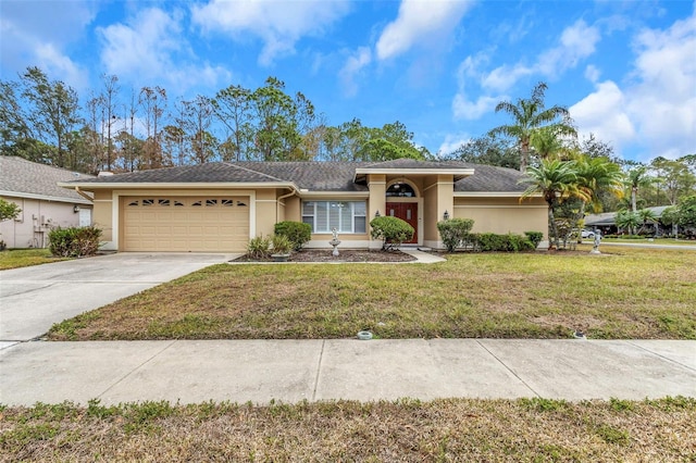 view of front of home featuring a front lawn and a garage