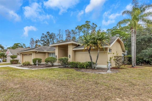 ranch-style house with a front yard and a garage